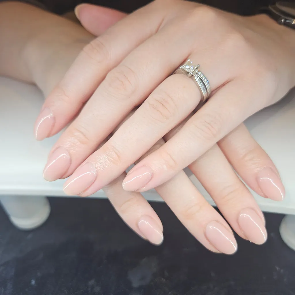 Glossy nude gel manicure